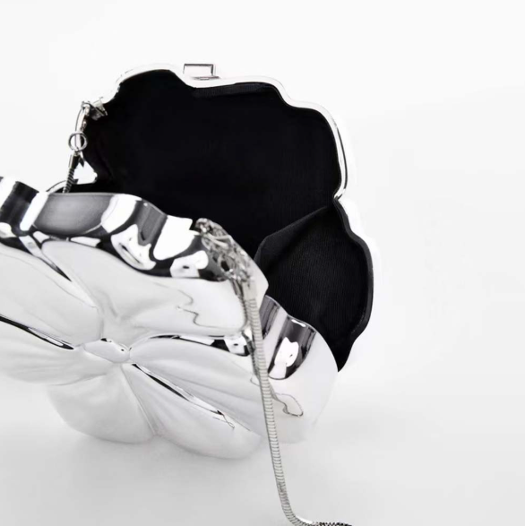 sculpted metallic flower clutch with chain strap – AUREZIA