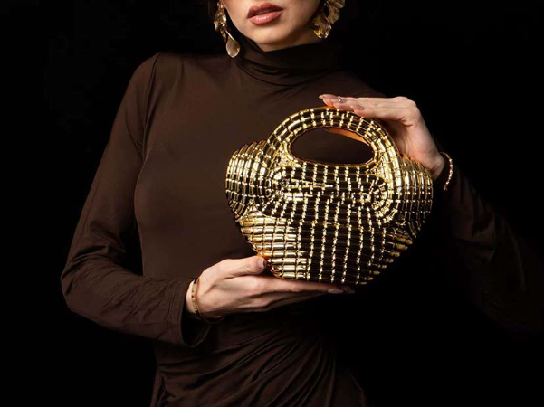woven metallic top-handle clutch – AURUM
