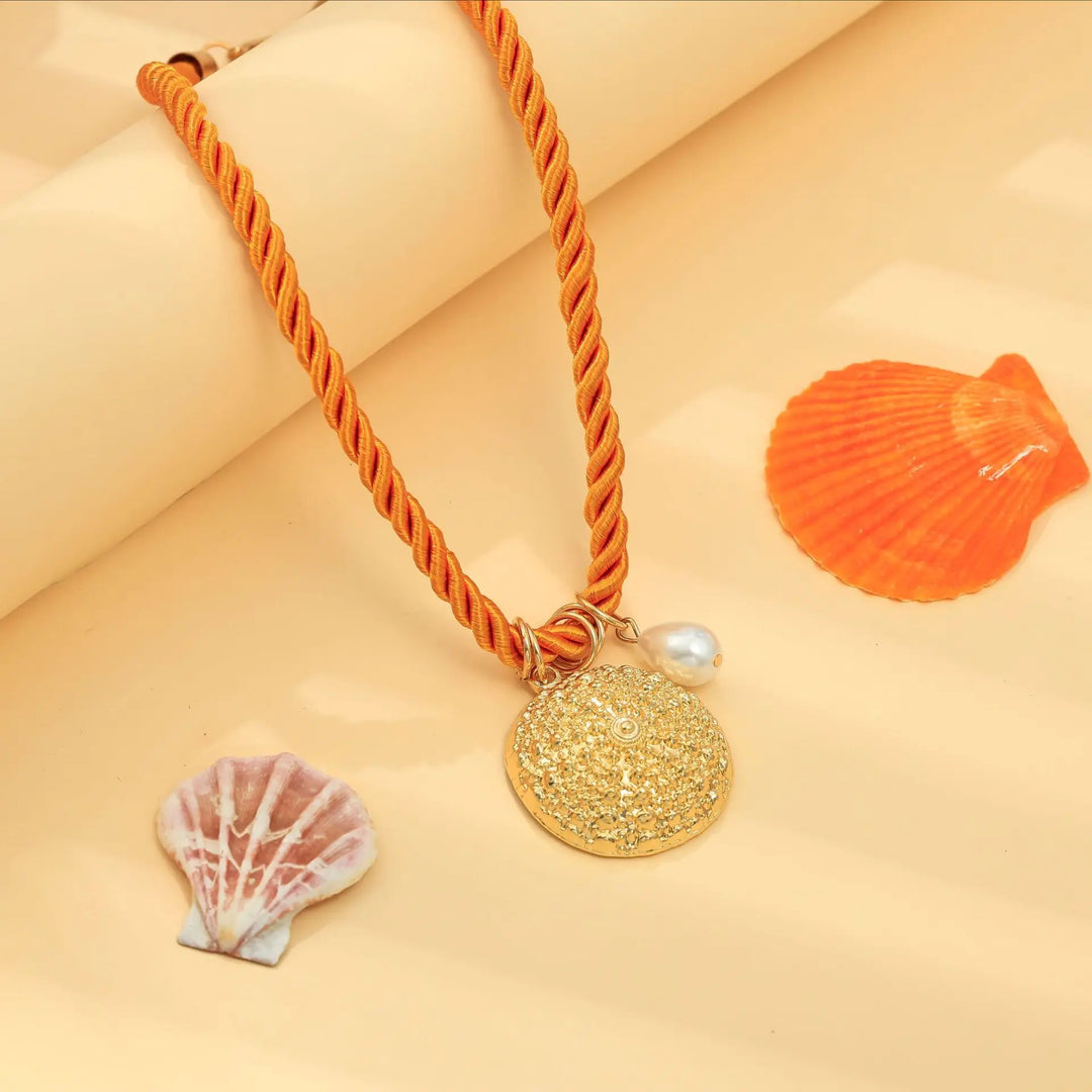 mouwloze uitlopende midi-jurk met kettingriem - CELIAV 