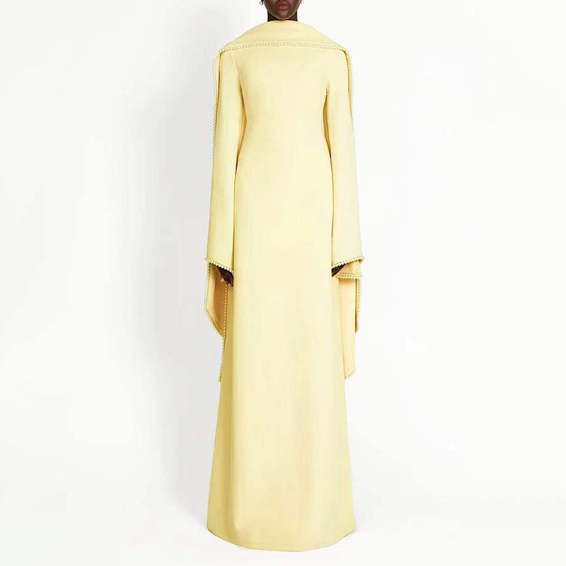long-sleeve column gown with draped cape trim – CELEVTER