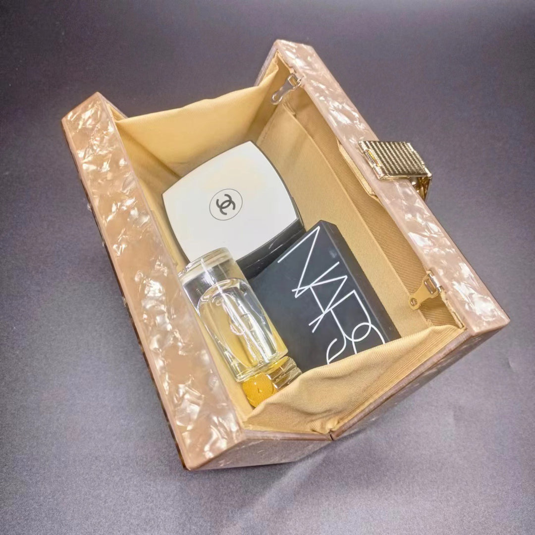 crystal-embellished acrylic clutch with floral lock – ESMENU