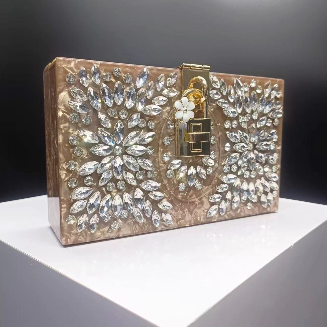 crystal-embellished acrylic clutch with floral lock – ESMENU