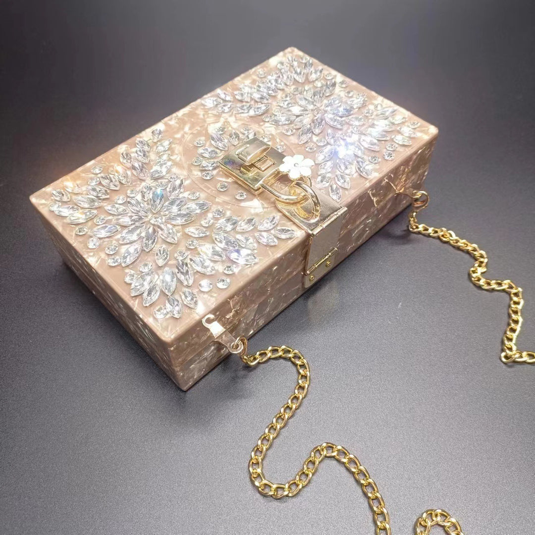 crystal-embellished acrylic clutch with floral lock – ESMENU