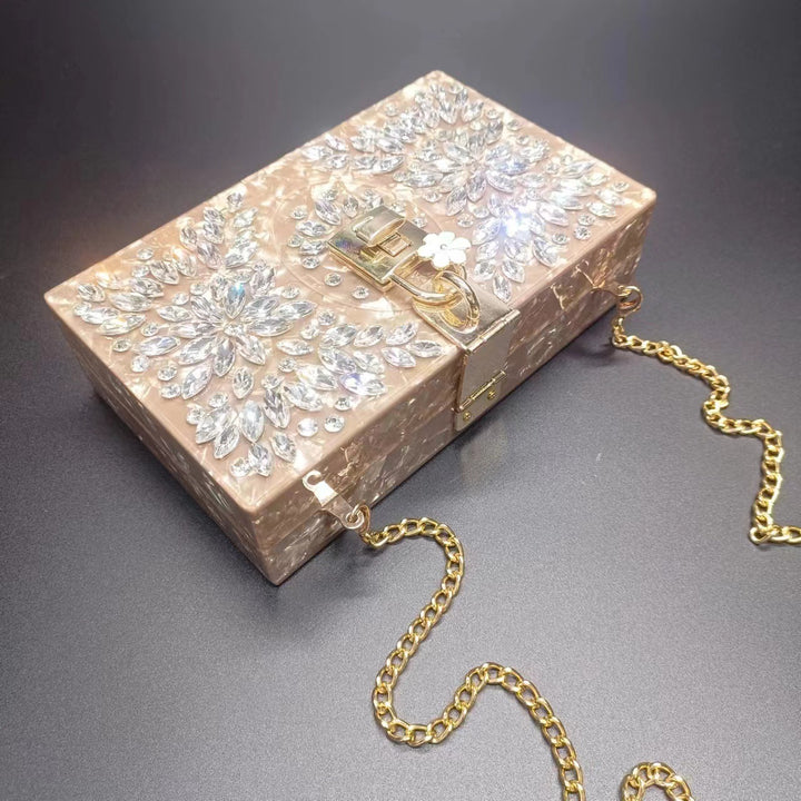 crystal-embellished acrylic clutch with floral lock – ESMENU