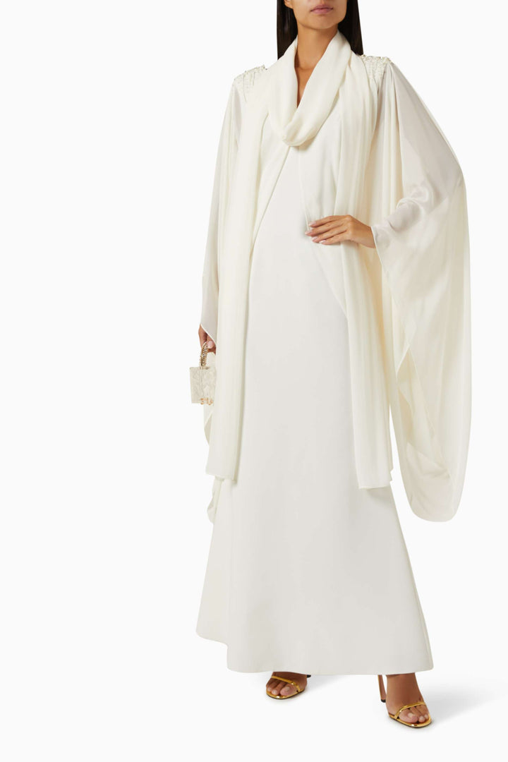 Draped cape gown with embellished shoulders – IVORYE