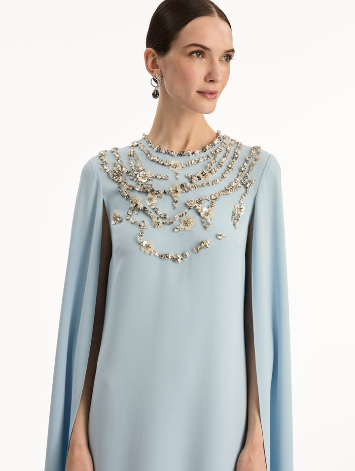 cape-sleeve gown with embellished neckline – AERIN