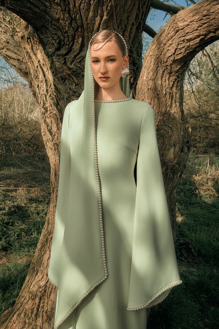 long-sleeve gown with draped pearl-trimmed cape – IVORY GRACE