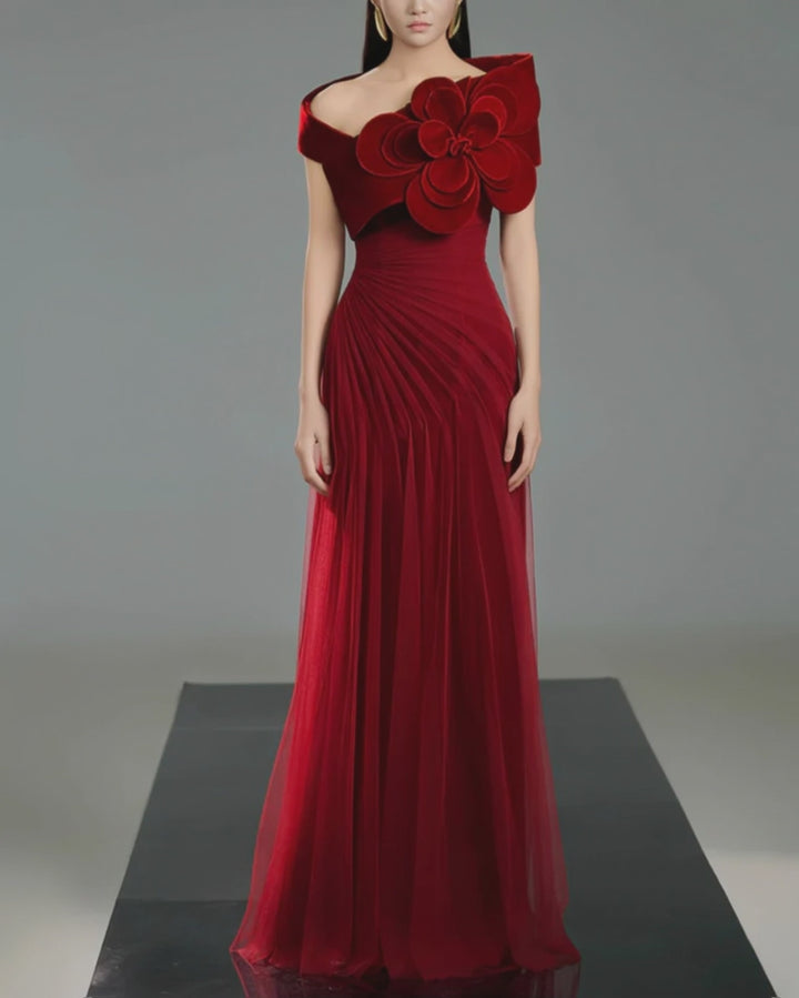Off-shoulder pleated gown with oversized floral detail – SCARFAH