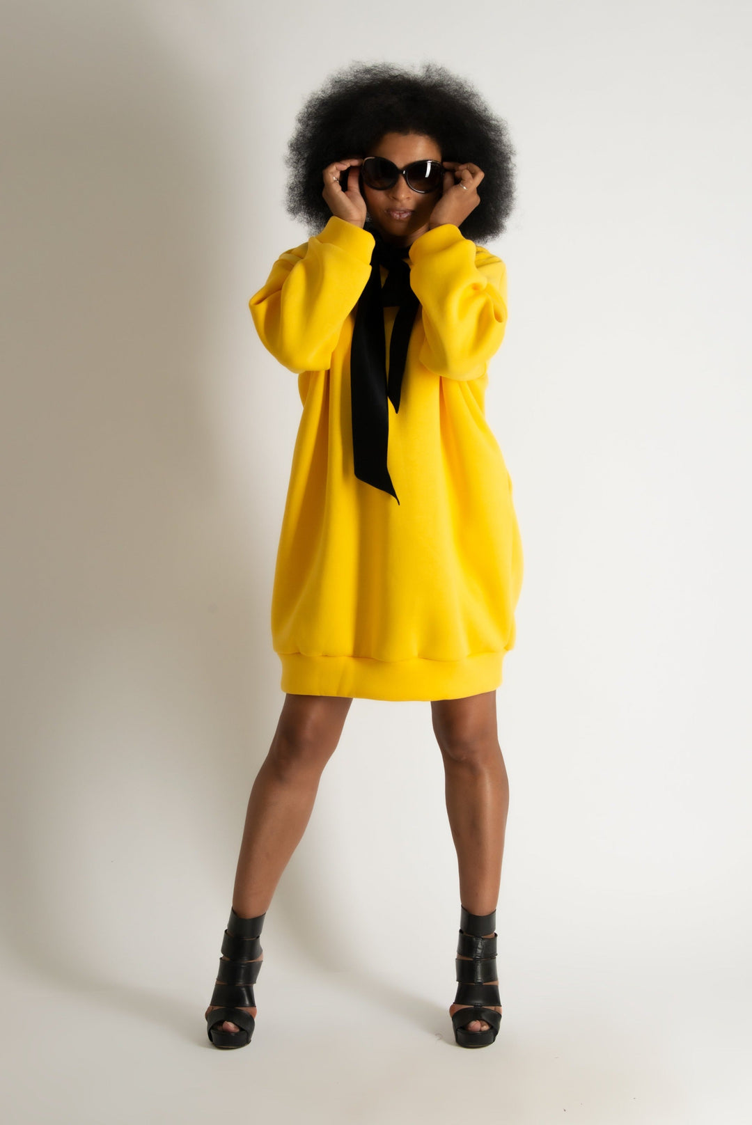 Yellow hooded dress